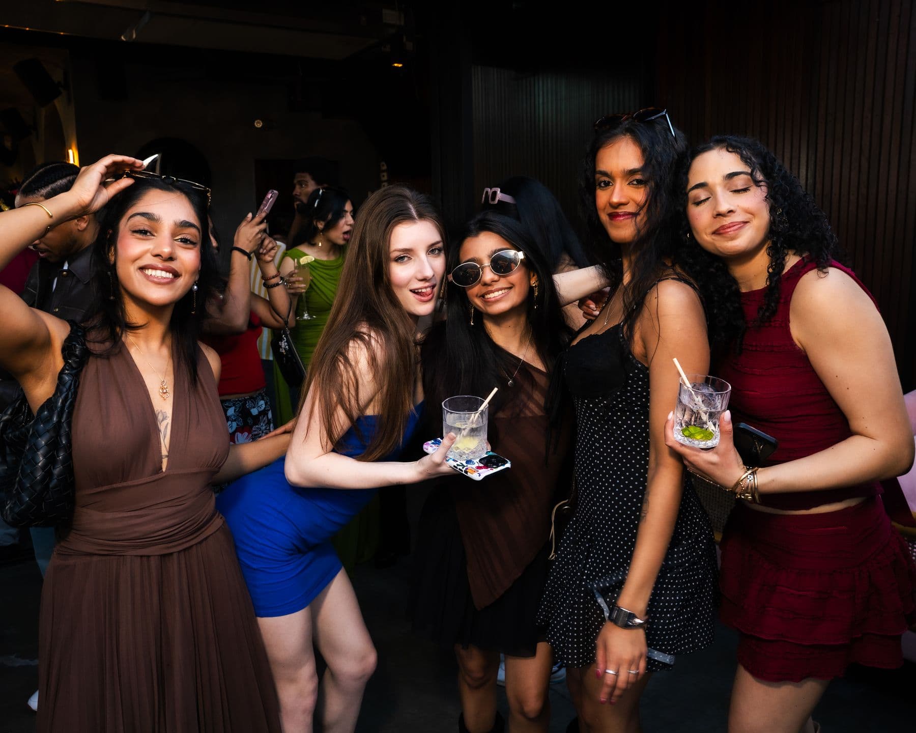 Six friends lined up for a photo